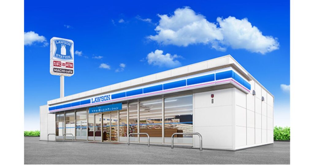 青空を背景にしたローソン（LAWSON）の店舗外観の写真。